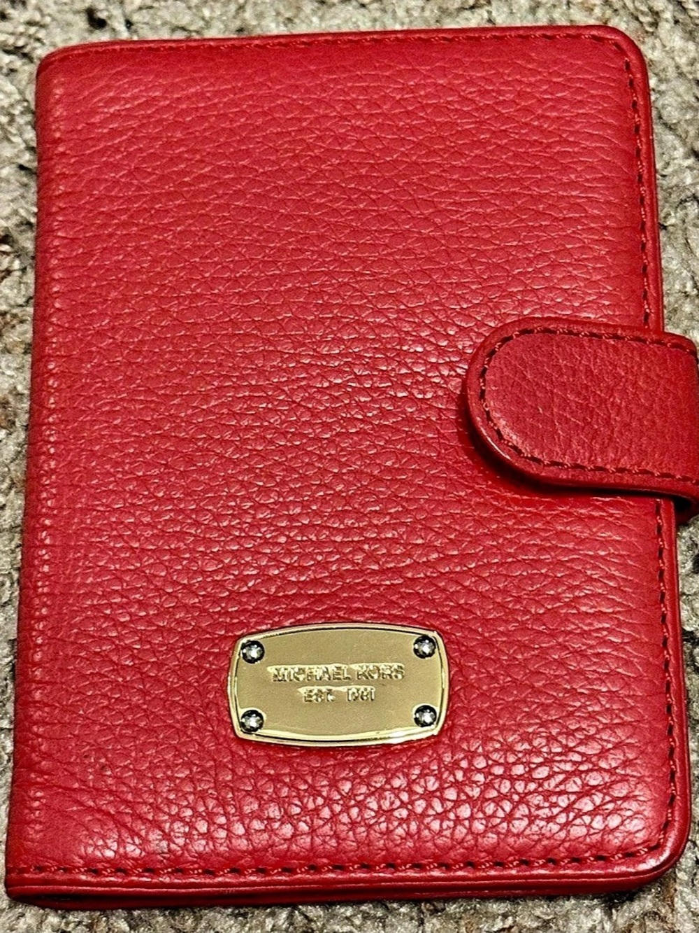 Michael Kors Leather-Texture passport wallet